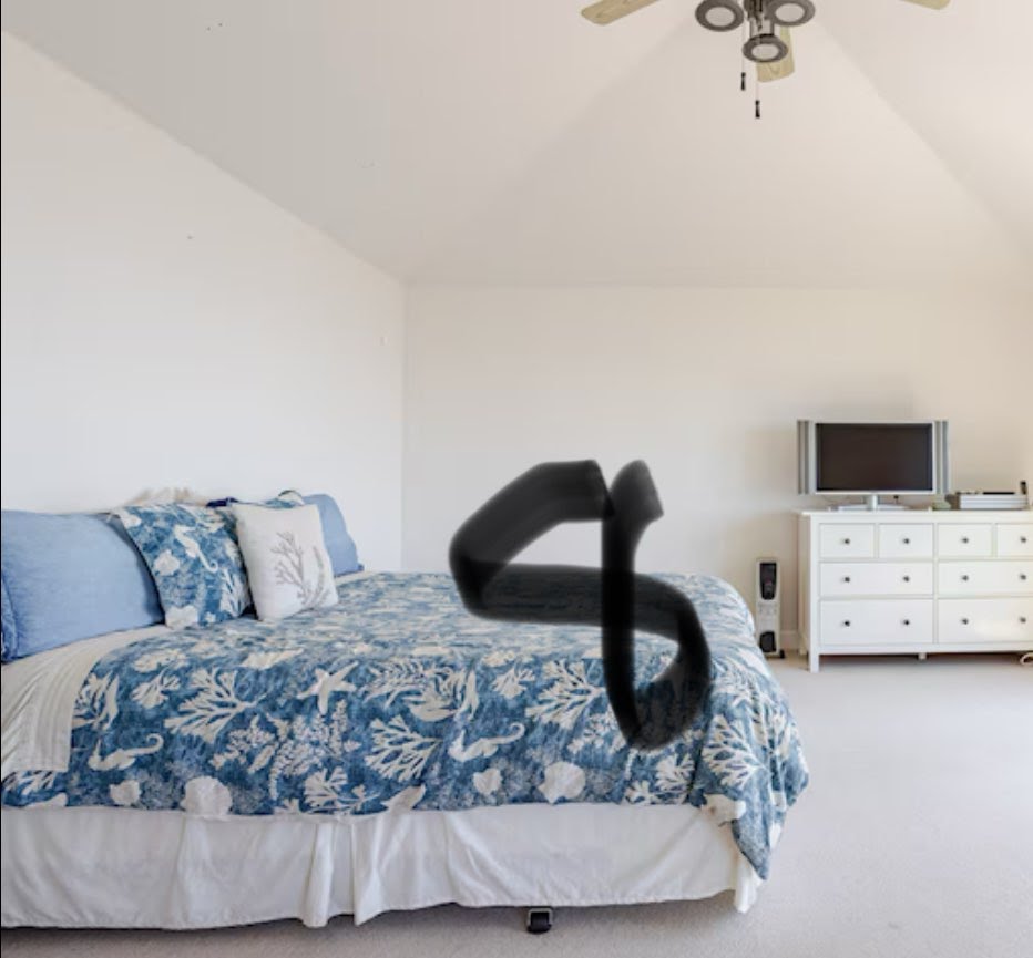 Bedroom with ocean-blue bedding